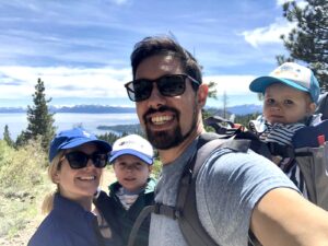 Featured image showing Karim Mekhid, his wife and two children in front of Lake Tahoe