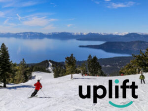 Featured image showing a downhill skier skiing above Lake Tahoe.