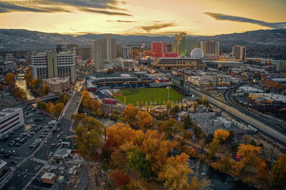 Featured images showing an aerial view of the Aces Ballpark and Downtown Reno, Nevada
