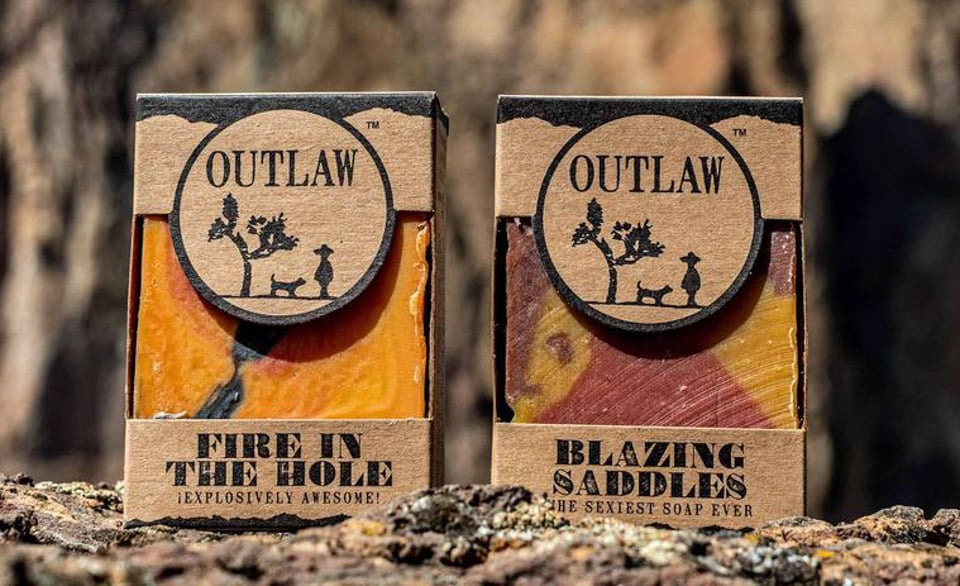 inline image showing two Outlaw Soaps in sustainable packaging