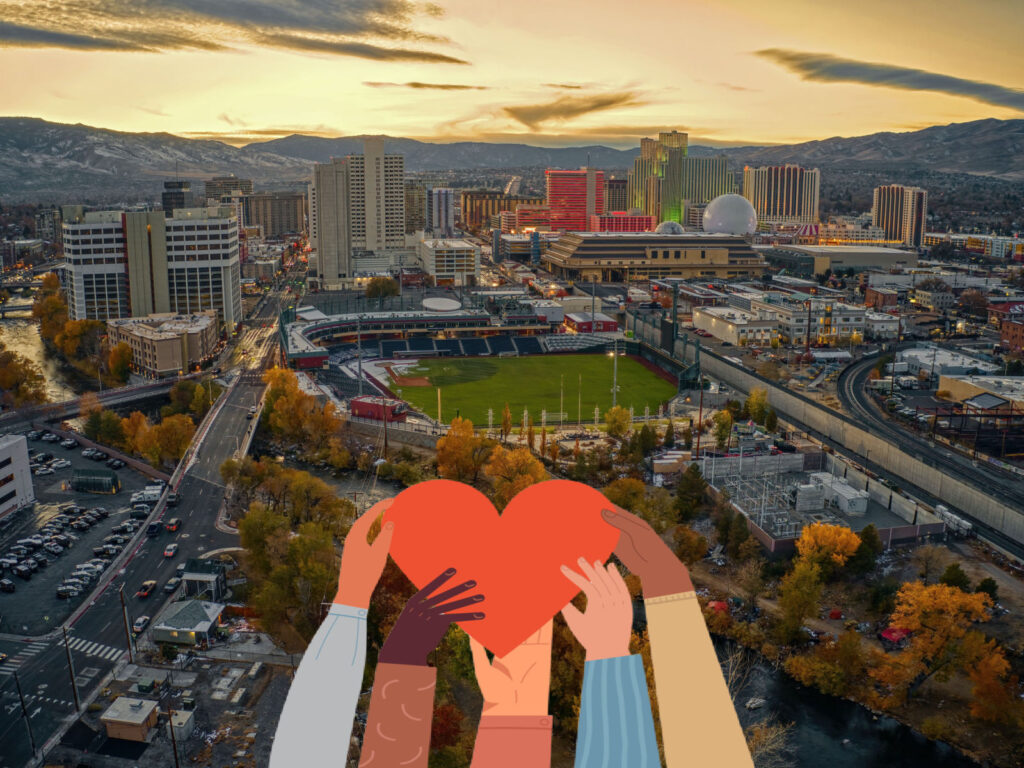 Inline image showing a vector image of hands holding a heart placed over Reno, Nevada's skyline.