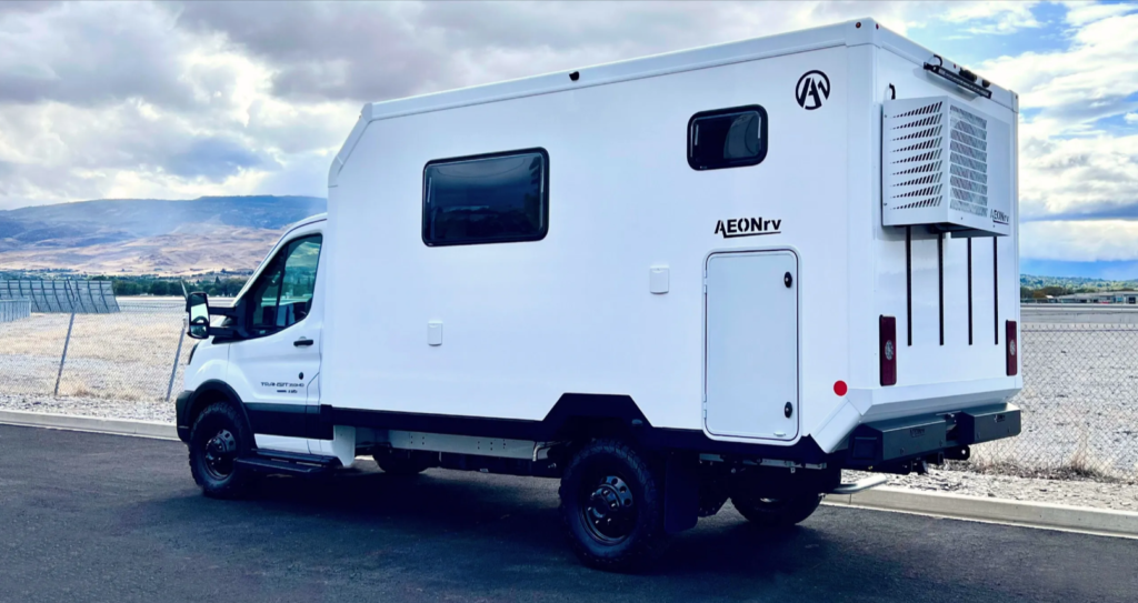 Featured image showing the first true all-season electric, off-road, new high-tech RV on a nevada freeway with the Sierra Mountains in the background. The RV is from AEONrv, a Reno based startup that is revolutionizing how recreational vehicles are designed, built, and delivered.